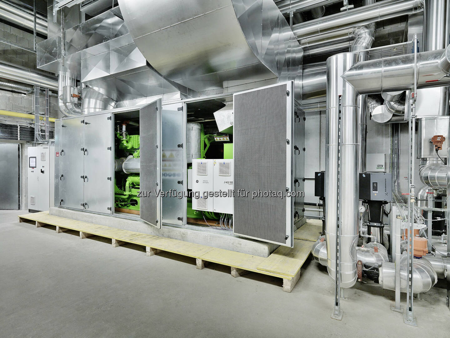 Mpreis setzt auf Gasmotorentechnologie von GE Jenbacher, Neues Blockheizkraftwerk versorgt Zentrale der Supermarktkette mit Strom und Wärme (Bild: GE Jenbacher)
