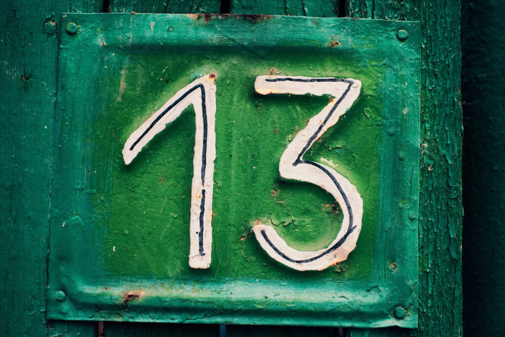 13, Dreizehn, http://www.shutterstock.com/de/pic-38275087/stock-photo-cyan-grungy-tin-house-plate-number-with-green-peeling-wooden-fence-and-selective-focus.html , © (www.shutterstock.com) (02.07.2014) 
