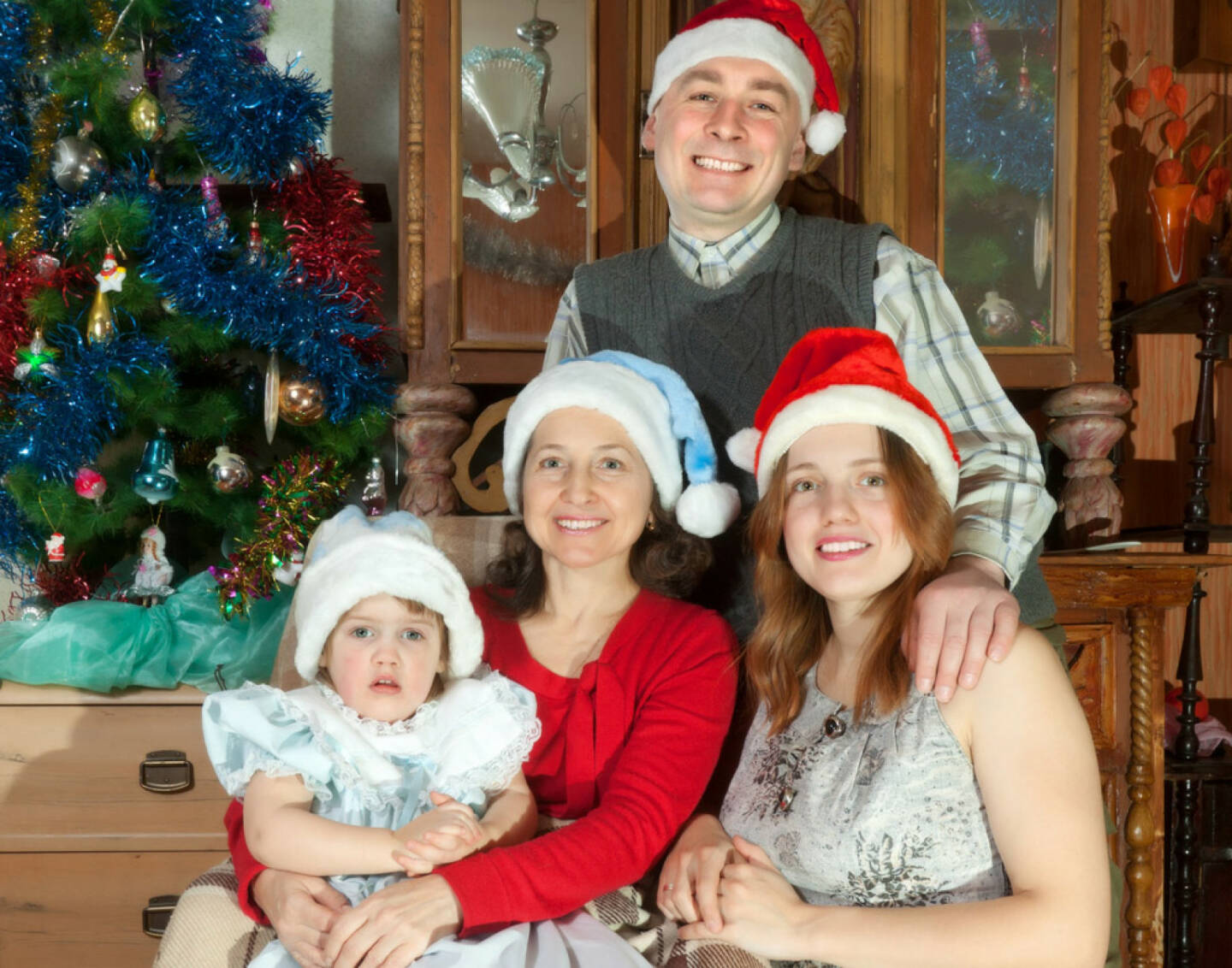 Weihnachten, USA, Zipfelmütze, Familie, http://www.shutterstock.com/de/pic-204978763/stock-photo-happy-family-of-three-generations-in-santa-hats-celebrating-christmas-in-living-room.html