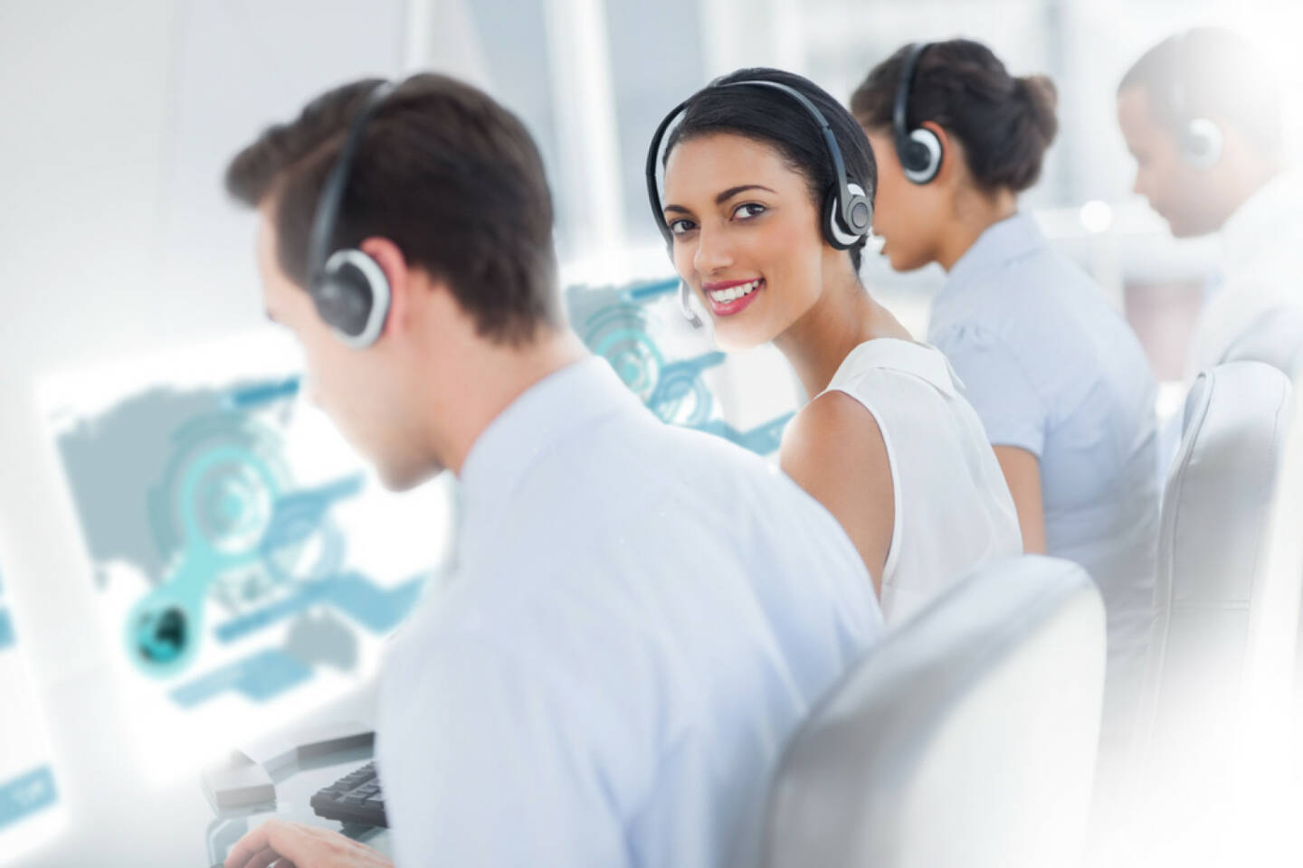 Call Center, Telefon, telefonieren, Vermittlung, Verbindung, Telekommunikation, http://www.shutterstock.com/de/pic-153721334/stock-photo-pretty-call-center-worker-using-futuristic-interface-hologram-smiling-at-camera-in-office.html